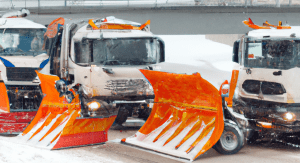 Snow plowing trucks